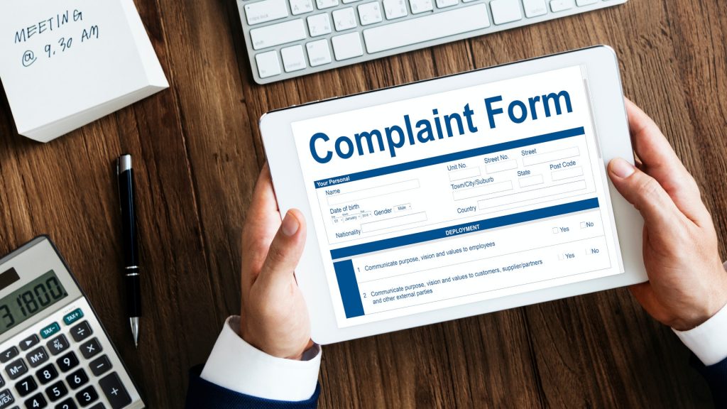 Complaints Form in Hand | Break Tag Digital Complaints